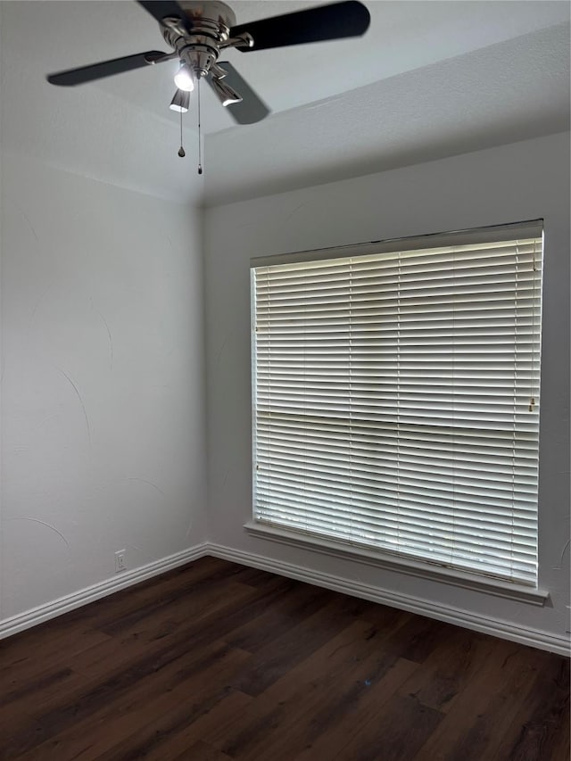 2505 Cimmaron Dr, Plano, TX 75025 - empty room with baseboards, dark wood-type flooring, and ceiling fan
