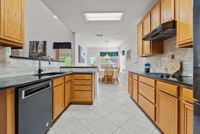 836 Stafford Station Dr, Saginaw, TX 76131 - kitchen with dishwasher, a sink, range hood, dark countertops, and a textured ceiling