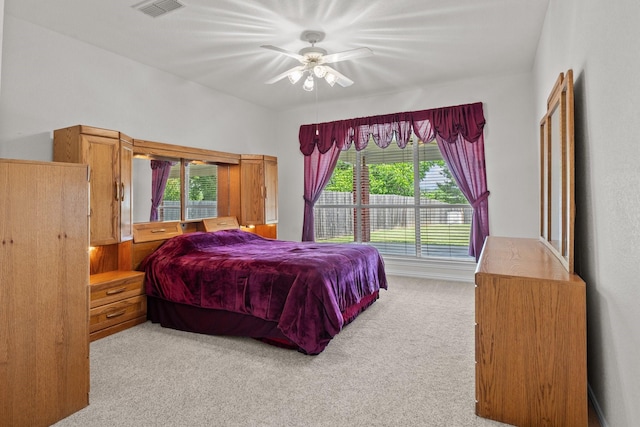 836 Stafford Station Dr, Saginaw, TX 76131 - bedroom with light colored carpet, multiple windows, and a ceiling fan