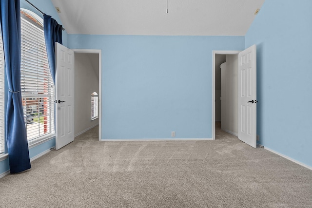 836 Stafford Station Dr, Saginaw, TX 76131 - unfurnished bedroom with carpet, baseboards, and vaulted ceiling