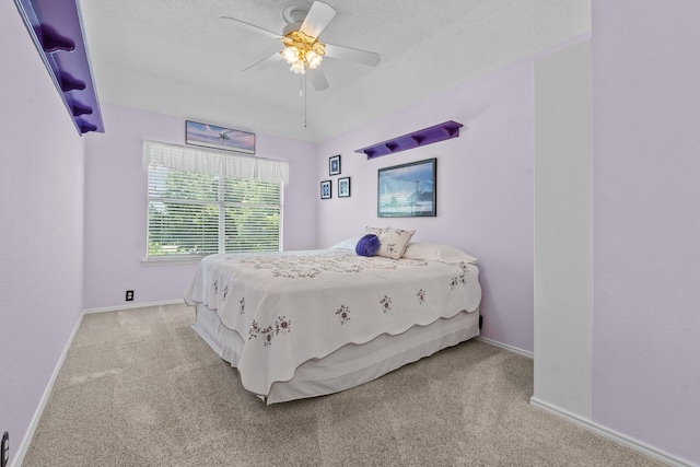 836 Stafford Station Dr, Saginaw, TX 76131 - bedroom featuring carpet, baseboards, ceiling fan, and a textured ceiling