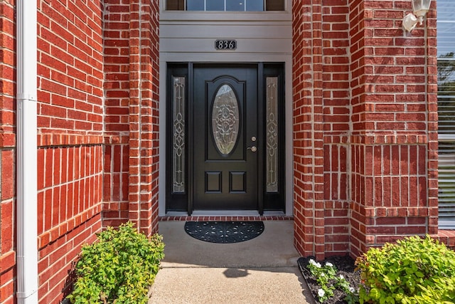 836 Stafford Station Dr, Saginaw, TX 76131 - view of exterior entry featuring brick siding