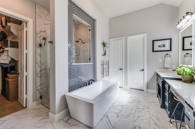 1305 Limestone Ridge Rd, Mansfield, TX 76063 - full bathroom featuring marble look tiles, a stall shower, a freestanding bath, and vanity