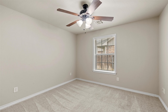 10121 Salem Way, Waco, TX 76708 - empty room featuring light colored carpet, a ceiling fan, and baseboards