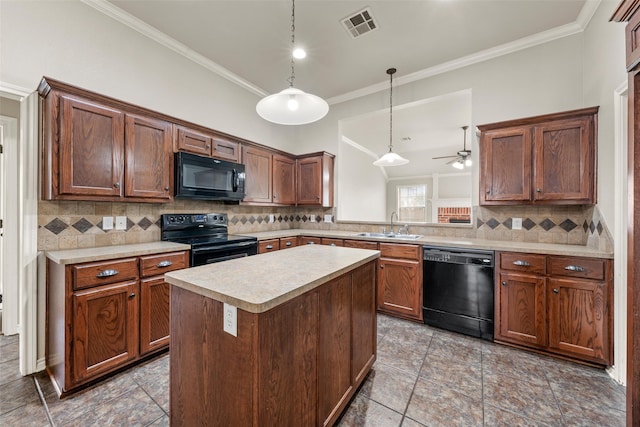 10121 Salem Way, Waco, TX 76708 - kitchen featuring black appliances, a sink, ornamental molding, light countertops, and a ceiling fan