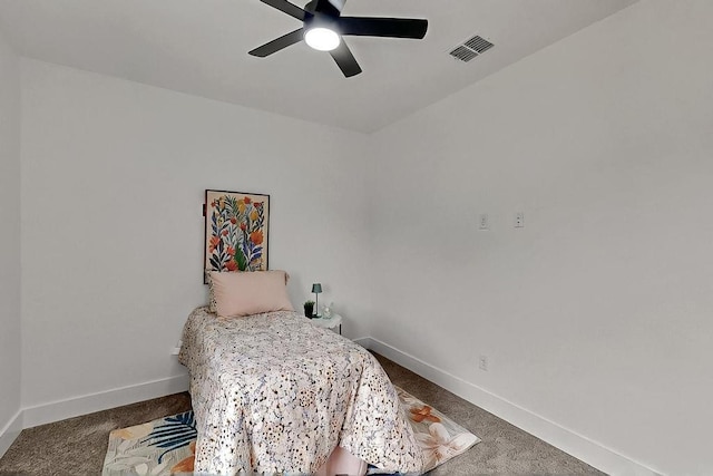 704 Witt, Wolfe City, TX 75496 - carpeted bedroom with baseboards and a ceiling fan