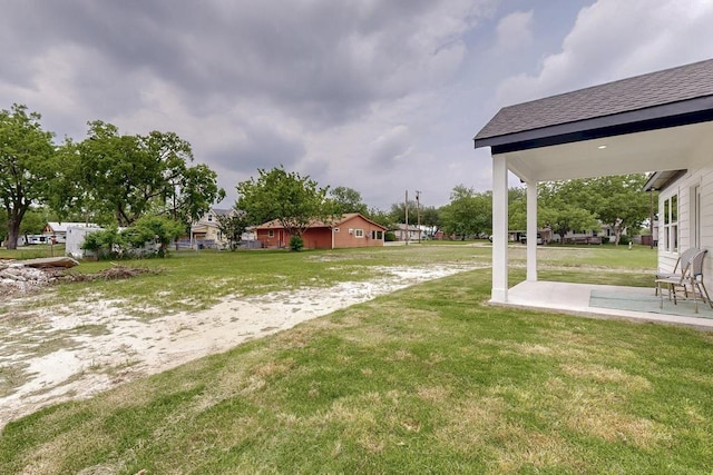 704 Witt, Wolfe City, TX 75496 - view of grassy yard featuring a patio