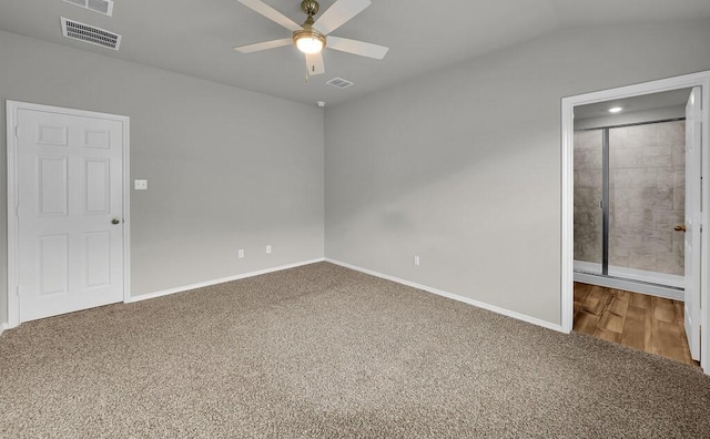 7025 Canadian Dr, Waco, TX 76633 - unfurnished bedroom featuring carpet, baseboards, a ceiling fan, and vaulted ceiling