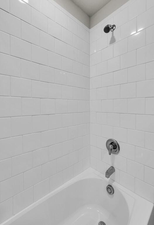 7025 Canadian Dr, Waco, TX 76633 - bathroom featuring shower / washtub combination