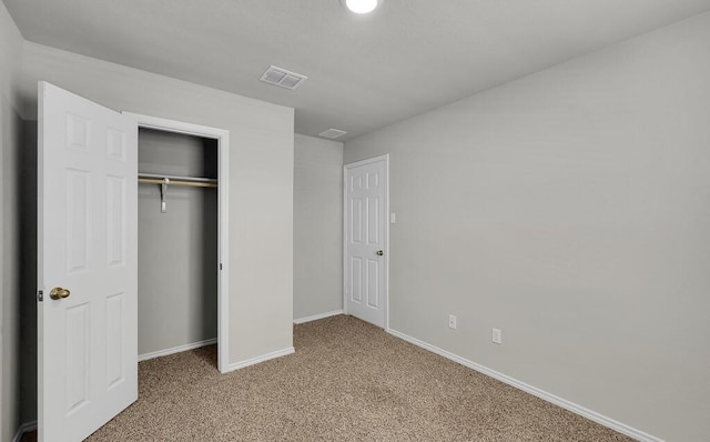 7025 Canadian Dr, Waco, TX 76633 - unfurnished bedroom featuring carpet floors, baseboards, and a closet