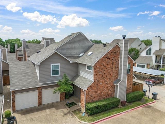 2500 Peargrove Cir, Arlington, TX 76006 - view of front of home featuring a garage, brick siding, a shingled roof, and driveway