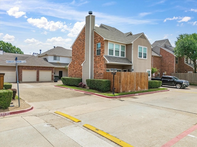 2500 Peargrove Cir, Arlington, TX 76006 - view of front of home featuring fence, a chimney, uncovered parking, brick siding, and a residential view