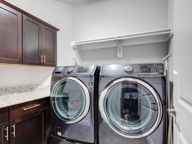 7428 E Fork Ln, Mckinney, TX 75071 - clothes washing area with cabinet space and independent washer and dryer