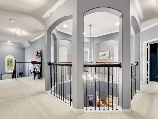 7428 E Fork Ln, Mckinney, TX 75071 - hall with an upstairs landing, carpet, crown molding, baseboards, and arched walkways