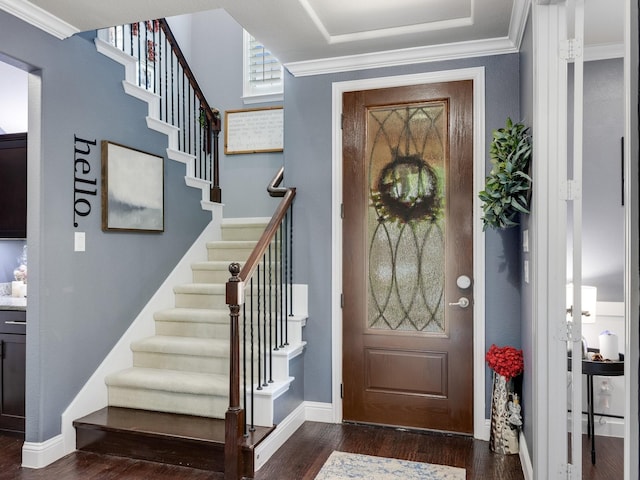7428 E Fork Ln, Mckinney, TX 75071 - foyer featuring dark wood-style floors, stairway, crown molding, and baseboards