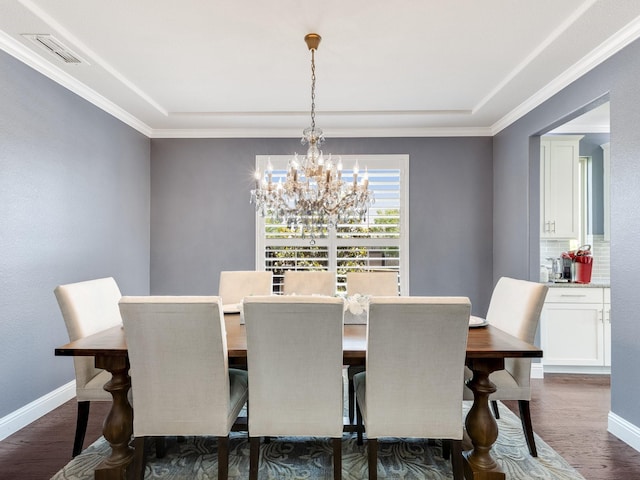 7428 E Fork Ln, Mckinney, TX 75071 - dining room with a chandelier, dark wood-style flooring, baseboards, and ornamental molding