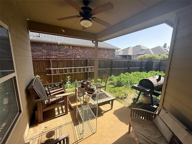 view of patio / terrace featuring a ceiling fan and a fenced backyard