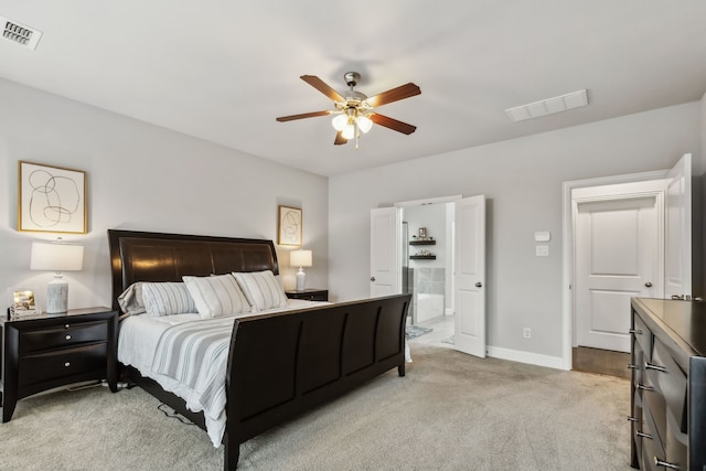 4138 Sanders Dr, Celina, TX 75009 - bedroom with light carpet, baseboards, ensuite bathroom, and a ceiling fan