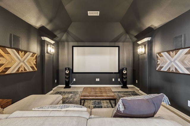 4138 Sanders Dr, Celina, TX 75009 - carpeted home theater featuring vaulted ceiling and baseboards