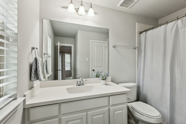 4138 Sanders Dr, Celina, TX 75009 - bathroom with toilet, vanity, and a shower with shower curtain