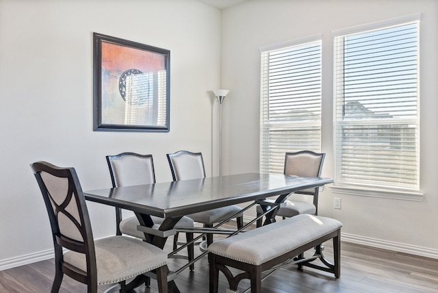 9517 Sunset Ln, Oak Point, TX 75068 - dining space featuring baseboards and wood finished floors