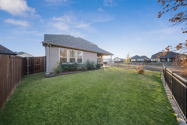 9517 Sunset Ln, Oak Point, TX 75068 - back of house with roof with shingles and brick siding