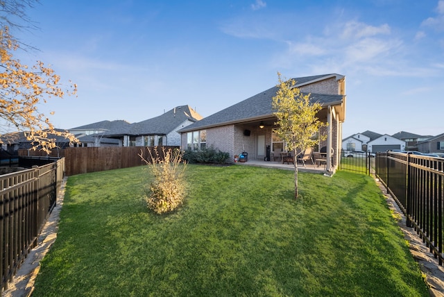 9517 Sunset Ln, Oak Point, TX 75068 - rear view of property with a patio area and a shingled roof
