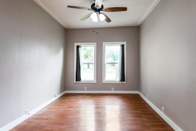 4410 Commerce St, Rowlett, TX 75088 - unfurnished room featuring ceiling fan, wood finished floors, ornamental molding, baseboards, and a textured wall