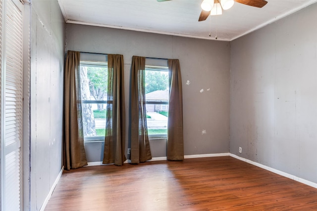 4410 Commerce St, Rowlett, TX 75088 - unfurnished room featuring wood finished floors, ceiling fan, baseboards, and ornamental molding