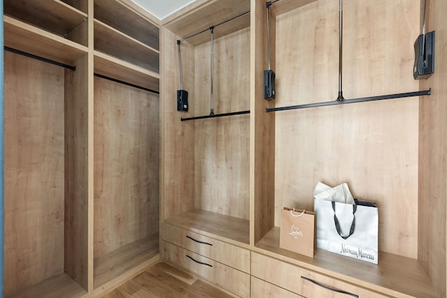 3943 Hawthorne Unit 102, Dallas, TX 75219 - spacious closet with wood finished floors