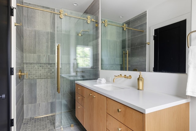 3943 Hawthorne Unit 102, Dallas, TX 75219 - bathroom featuring a stall shower and vanity
