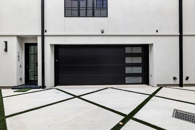3943 Hawthorne Unit 102, Dallas, TX 75219 - garage with concrete driveway