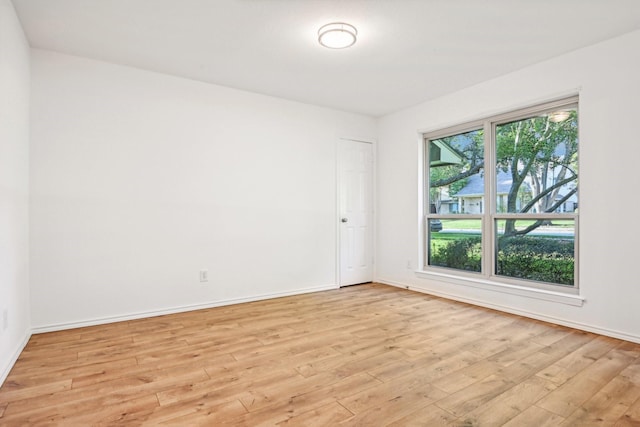 4400 Boston Dr, Plano, TX 75093 - empty room with light wood finished floors and baseboards