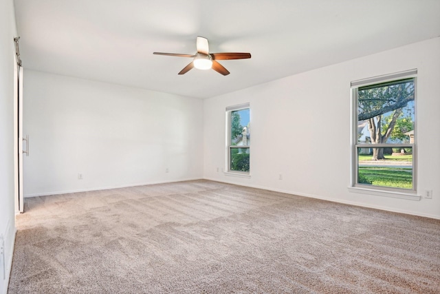 4400 Boston Dr, Plano, TX 75093 - spare room featuring ceiling fan, carpet floors, and baseboards