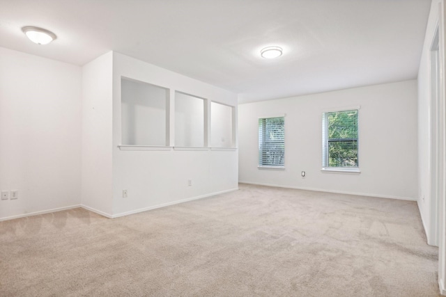 4400 Boston Dr, Plano, TX 75093 - carpeted spare room featuring baseboards