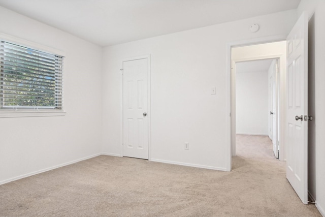 4400 Boston Dr, Plano, TX 75093 - unfurnished bedroom with light colored carpet and baseboards