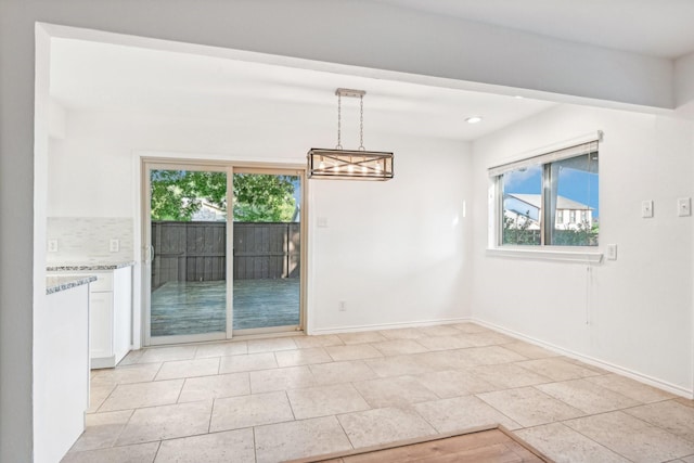 4400 Boston Dr, Plano, TX 75093 - unfurnished dining area with baseboards, recessed lighting, and light tile patterned floors