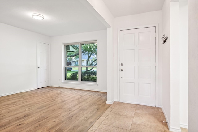 4400 Boston Dr, Plano, TX 75093 - foyer with baseboards and light wood-type flooring