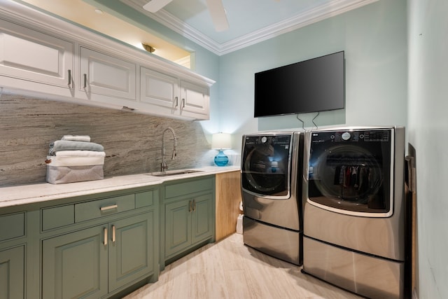 1532 Main St, Southlake, TX 76092 - laundry room with separate washer and dryer, cabinet space, crown molding, and a ceiling fan