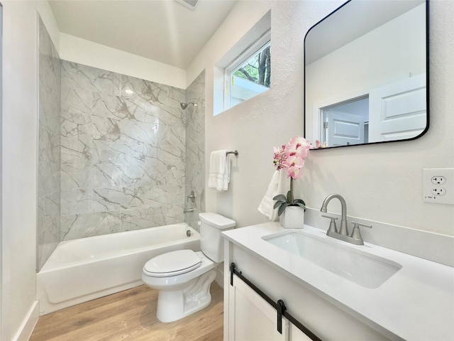 3801 Carpenter Ave, Dallas, TX 75210 - bathroom featuring wood finished floors, toilet, bathtub / shower combination, and vanity