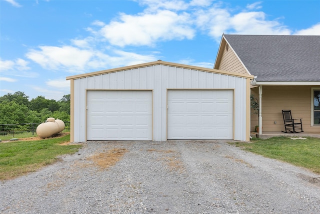 677 County Road 4027, Savoy, TX 75479 - garage with gravel driveway and fence