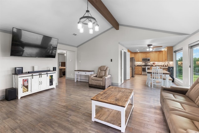 677 County Road 4027, Savoy, TX 75479 - living room featuring a chandelier, wood finished floors, and a ceiling fan