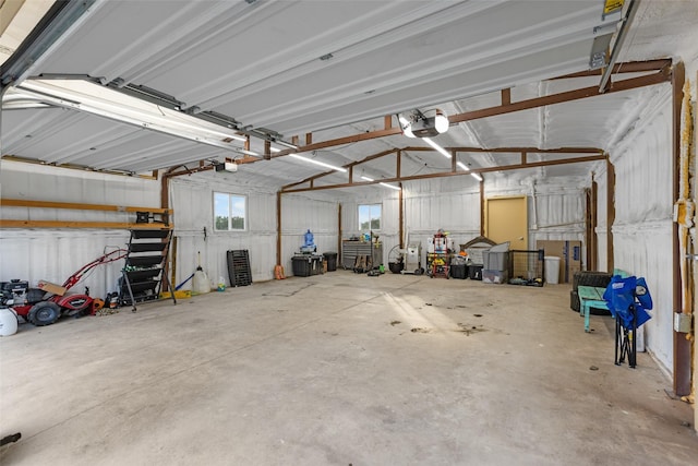 677 County Road 4027, Savoy, TX 75479 - garage featuring a garage door opener