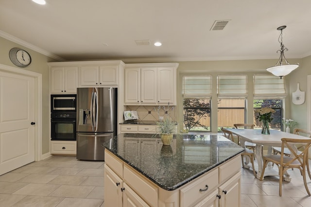 3002 Spring Hill Ln, Highland Village, TX 75077 - kitchen with stainless steel fridge, black oven, built in microwave, ornamental molding, and light tile patterned floors