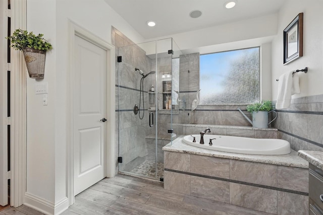 3002 Spring Hill Ln, Highland Village, TX 75077 - full bathroom with a bath, a shower stall, wood finished floors, and recessed lighting