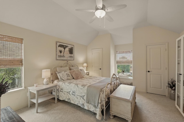 3002 Spring Hill Ln, Highland Village, TX 75077 - bedroom with light colored carpet, multiple windows, vaulted ceiling, and baseboards