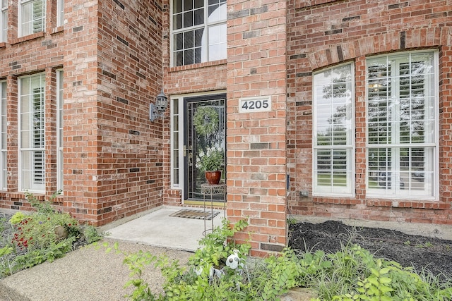 4205 English Ivy Dr, Mckinney, TX 75070 - doorway to property with brick siding