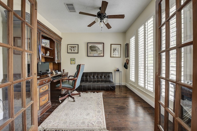 4205 English Ivy Dr, Mckinney, TX 75070 - home office featuring ceiling fan, a textured ceiling, dark wood-style flooring, french doors, and baseboards