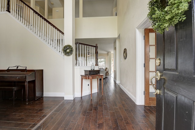 4205 English Ivy Dr, Mckinney, TX 75070 - entrance foyer with a high ceiling, wood finished floors, and baseboards
