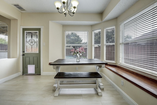 4205 English Ivy Dr, Mckinney, TX 75070 - dining room with healthy amount of natural light, a chandelier, and baseboards